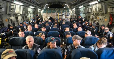 USAID search and rescue team, which will join earthquake response efforts in the Adıyaman province, are seen in the aircraft, Feb. 8, 2023. (Handout Photo)
