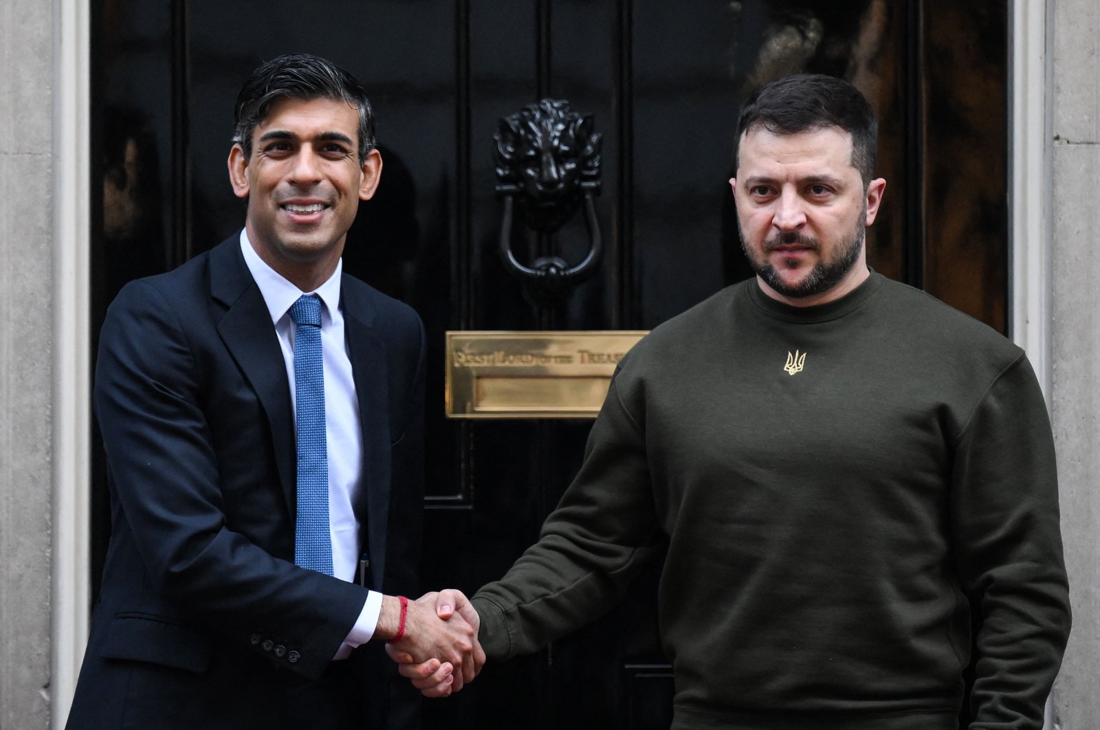 Ukraine&#039;s President Volodymyr Zelenskyy (R) shakes hands with Britain&#039;s Prime Minister Rishi Sunak after arriving at 10 Downing Street, London, U.K., Feb. 8, 2023. (AFP Photo)