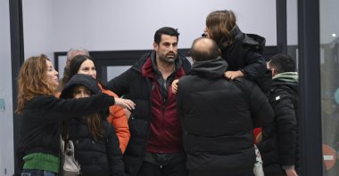 Hatayspor coach Volkan Demirel (C) arrives at Istanbul Airport with his team, Istanbul, Türkiye, Feb. 8, 2023. (AA Photo)
