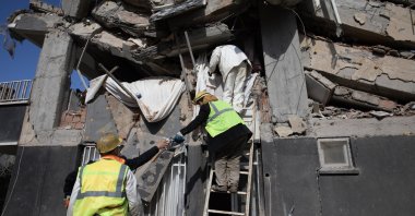 Search and rescue crews work in the rubble, in Adıyaman, southeastern Türkiye, Feb. 9, 2023. (AA Photo)