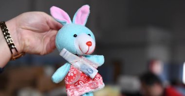 A 5-year-old sends his toy with his saved pocket money of TL 100 in an aid box to the earthquake-hit area of the southeast, Edirne, Türkiye, Feb. 7, 2023. (DHA Photo)