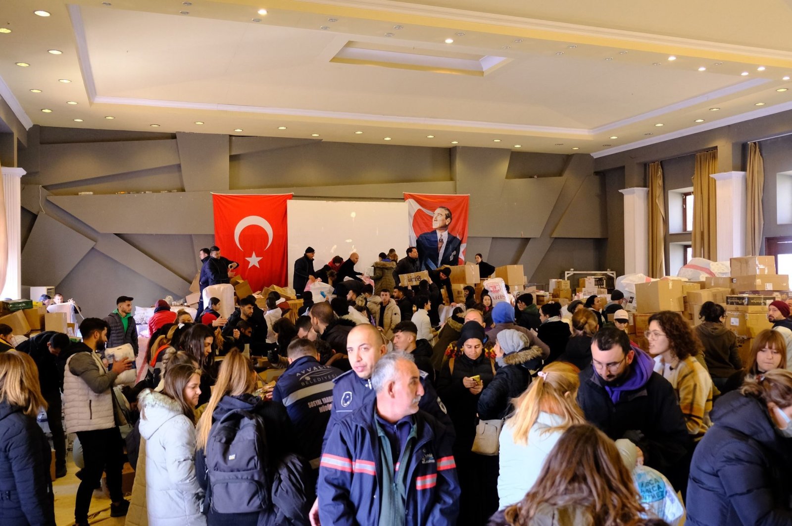 People collecting donated materials within the scope of the aid campaign launched for earthquake victims, in the Aegean province Balıkesir&#039;s Ayvalık, Türkiye, Feb. 9, 2023. (IHA Photo)