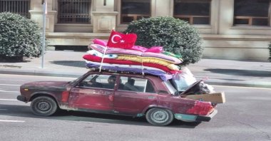 Azerbaijani Server Beşirli is seen in his car delivering aid for Türkiye's earthquake victims in the streets of Baku, Azerbaijan, Feb. 9, 2023 (IHA Photo)