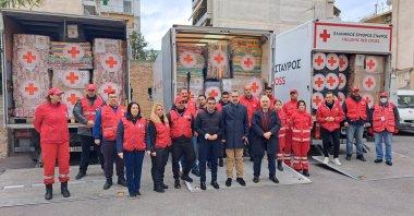 The Greek Red Cross trucks loaded up with humanitarian aid for earthquake victims in Türkiye before they set off on Friday, in Athens, Greece, Feb. 10, 2023. (AA Photo)