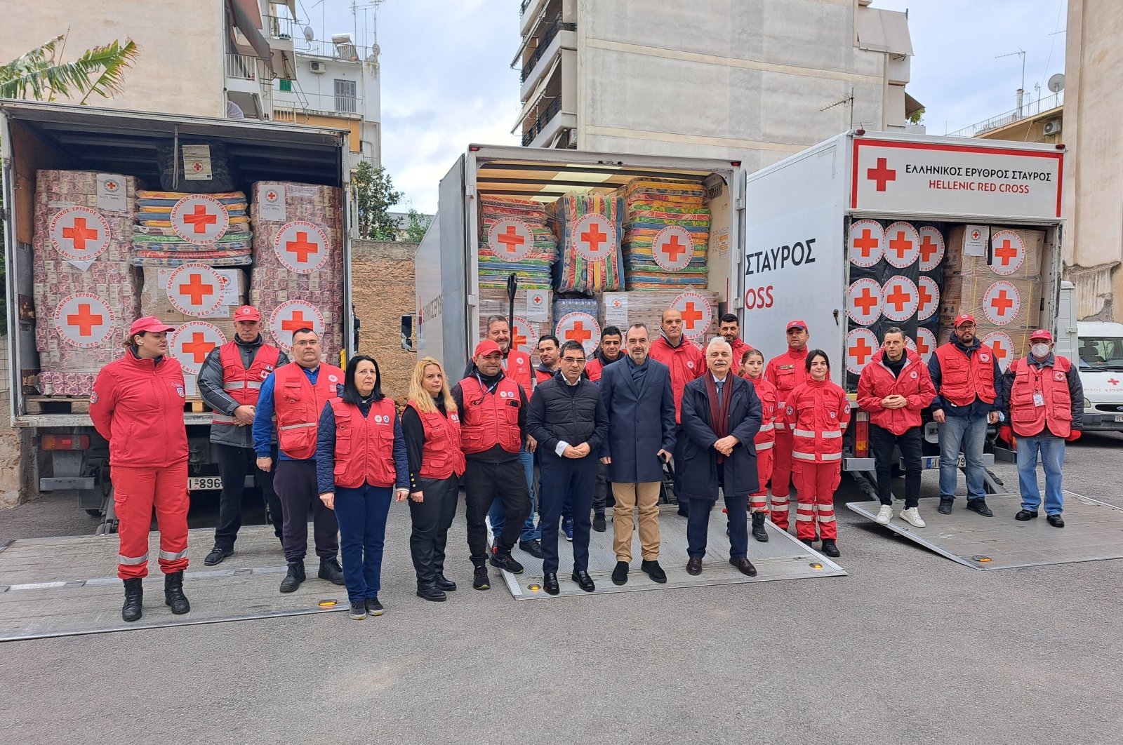 The Greek Red Cross trucks loaded up with humanitarian aid for earthquake victims in Türkiye before they set off on Friday, in Athens, Greece, Feb. 10, 2023. (AA Photo)