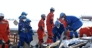 Blue Sky Rescue (BSR) teams sift through debris in Malatya, southern Türkiye, Feb. 11, 2023. (AA Photo)