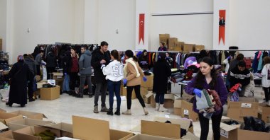 Volunteers from Bursa, Bilecik and surrounding provinces collect aid for earthquake-hit areas, Feb. 12, 2023. (AA Photo)