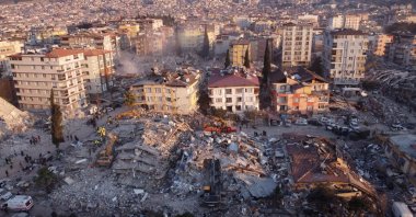 An aerial photo shows collapsed buildings following an earthquake in Antakya, southeastern Türkiye, February 11, 2023. (AFP Photo)
