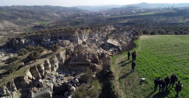 A 300-meter-long, 50-meter-wide and 40-meter-deep valley was formed in an olive grove in the Altınözü district of Hatay, following the Feb. 6 earthquakes, Hatay, southeastern Türkiye, Feb. 11, 2023. (DHA Photo)