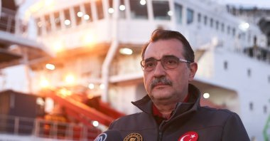 Energy and Natural Resources Minister Fatih Dönmez speaks to Anadolu Agency (AA) in Iskenderun, Hatay, Türkiye, Feb. 14, 2023. (AA Photo)