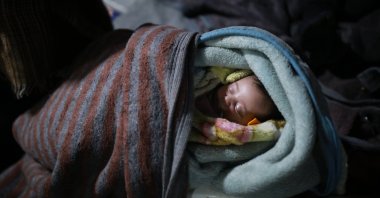 A 10-day-old baby was rescued in Idlib after a quake hit Syria and Türkiye, Syria, Feb. 14, 2023. (AA Photo)