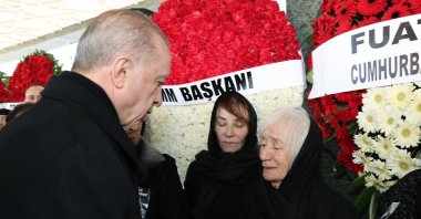 President Recep Tayyip Erdoğan extends condolences to former CHP Chair Deniz Baykal's wife Olcay (L) and daughter Aslı (R) at the funeral, in the capital Ankara, Türkiye, Feb. 14, 2023. (AA Photo)