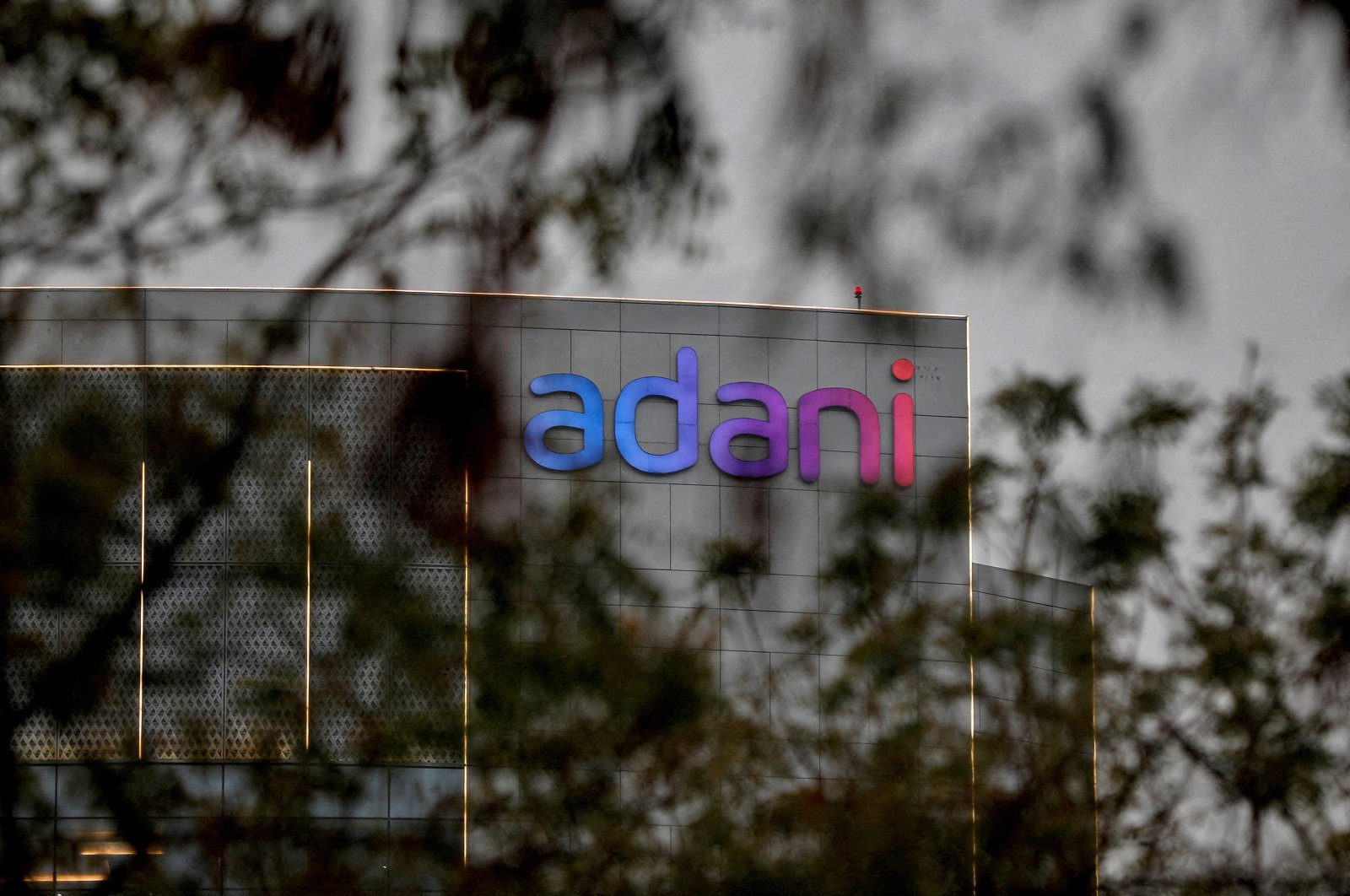 The logo of the Adani Group is seen on the facade of its Corporate House on the outskirts of Ahmedabad, India, Jan. 27, 2023. (Reuters Photo)