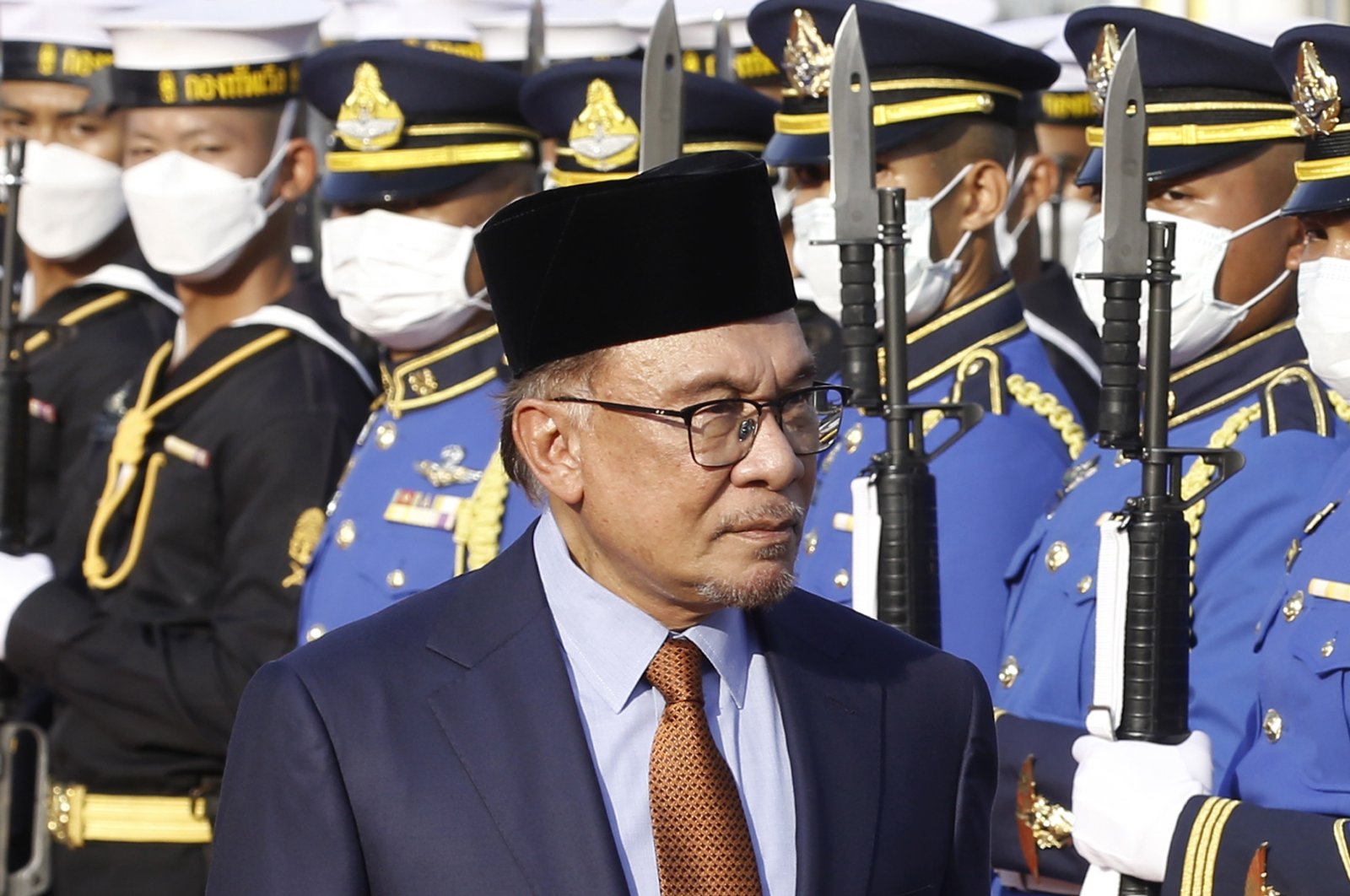 Malaysian Prime Minister Anwar Ibrahim reviews a guard of honor during a welcoming ceremony at Government House in Bangkok, Thailand, Feb. 9, 2023. (EPA Photo)