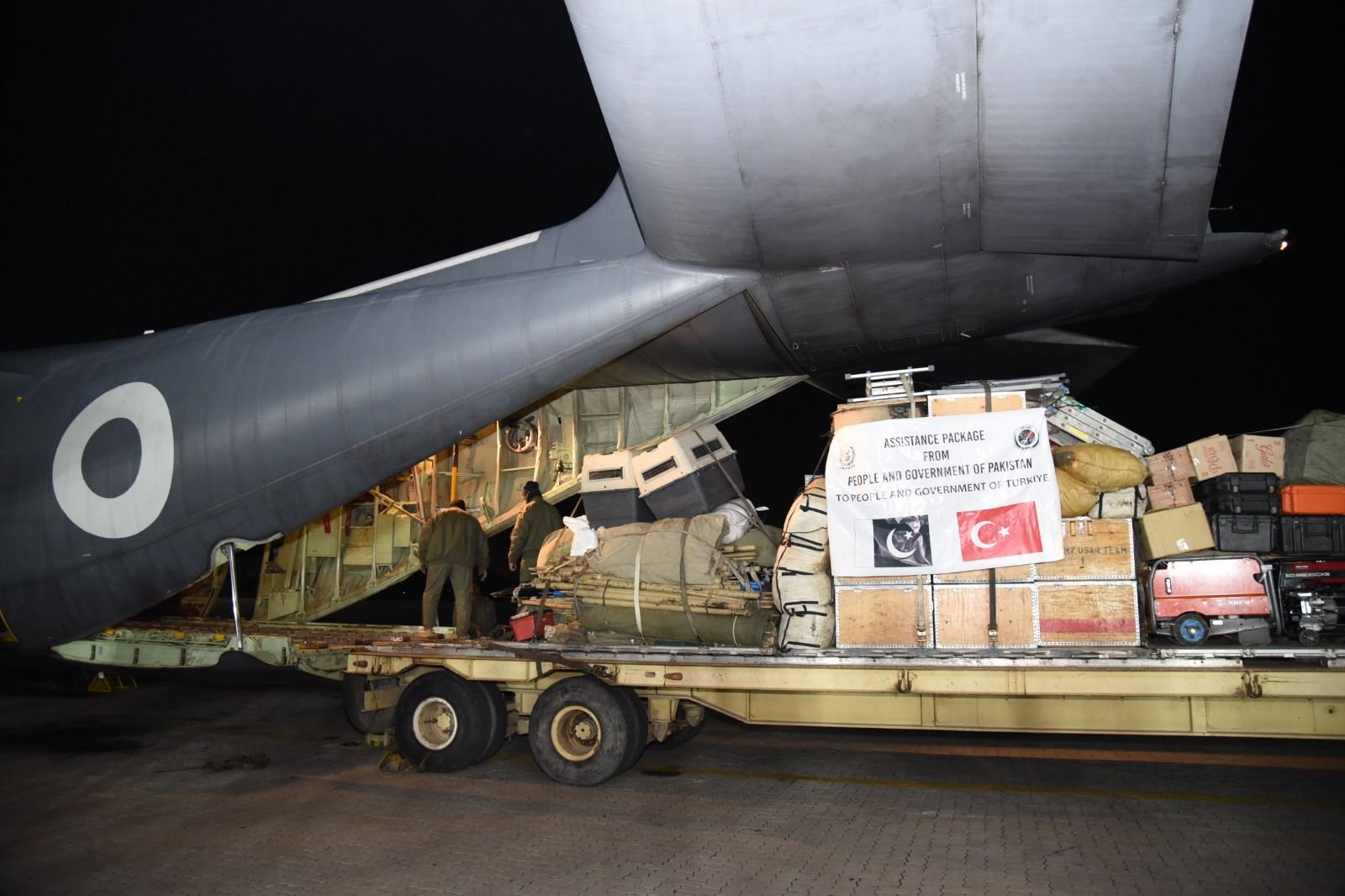 Tons of humanitarian aid is seen at the Chakala airbase in Rawalpindi, Pakistan, to be sent to Türkiye&#039;s Adana province, Feb.7, 2023 (AA Photo)
