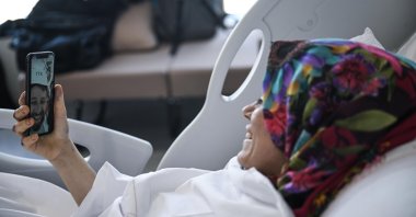 Songül Göksu talks to her rescuers in a video call at the hospital she was treated, in the capital Ankara, Türkiye, Feb. 13, 2023. (AA Photo)