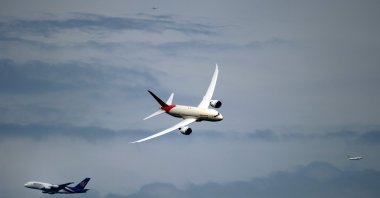 n this file photo taken on June 20, 2013, an Air India Boeing Dreamliner (C) flies over Le Bourget Airport near Paris during the 50th International Paris Air show. (AFP Photo)