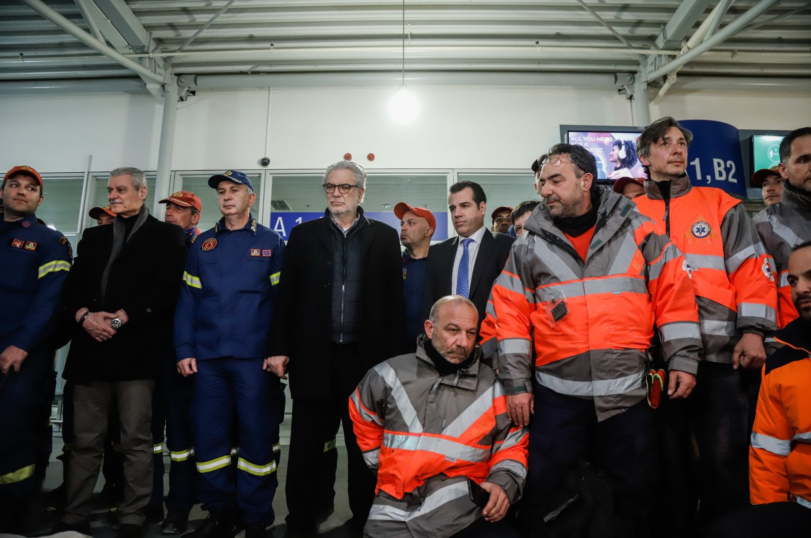 Greek emergency unit EMAK members pose for a picture at Athens Eleftherios Venizelos International Airport ahead of a press conference upon returning from a rescue mission in Türkiye&#039;s Hatay following deadly earthquakes, Greece, Feb. 13, 2023. (IHA Photo)