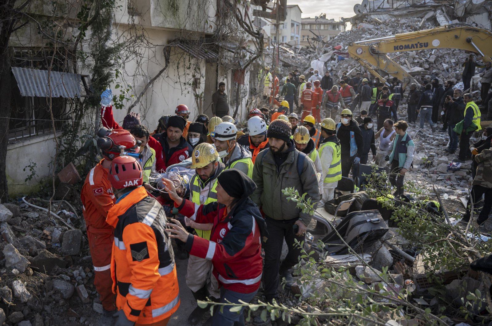 Rescue teams carry out a woman from the rubble, on the 228th hour of the Feb. 6 earthquakes, in Hatay, Türkiye, Feb. 15, 2023. (AA Photo)