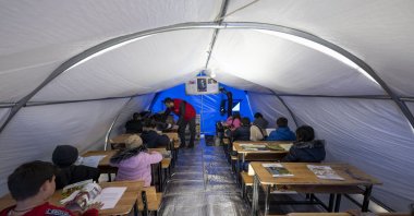 Children affected by the earthquake study in their tent schools in Adıyaman, Türkiye, Feb. 16, 2023. (AA Photo)