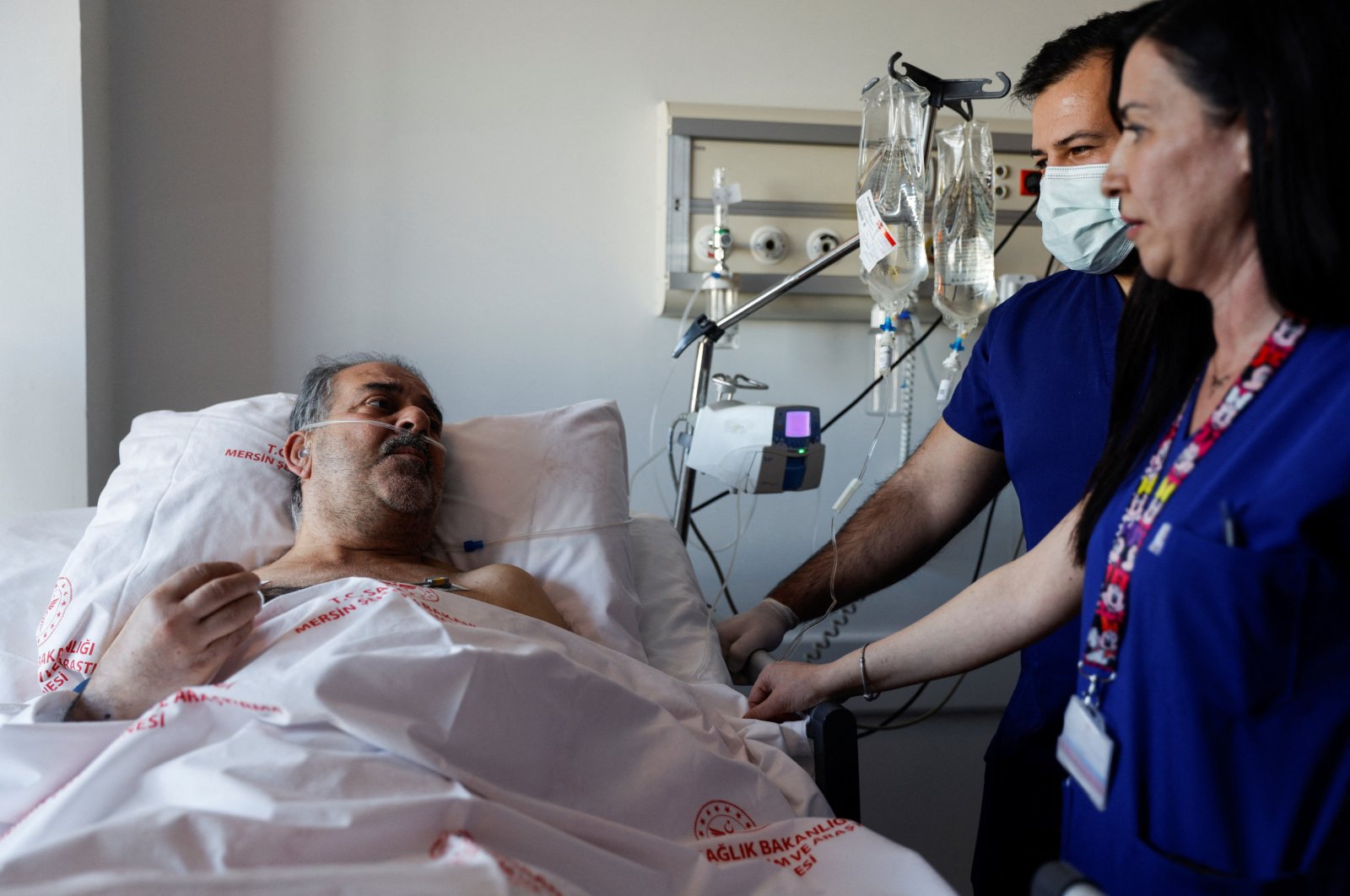 Hüseyin Berber, a survivor, speaks to media and doctors at a hospital, in Mersin, southern Türkiye, Feb. 15, 2023. (Reuters Photo) 