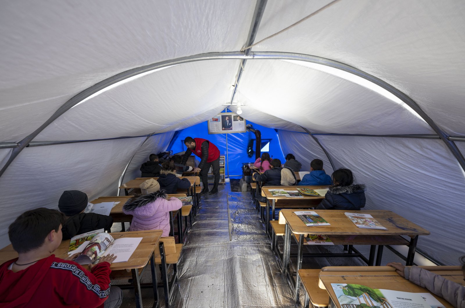 Children affected by the earthquake study in their tent schools in Adıyaman, Türkiye, Feb. 16, 2023. (AA Photo)