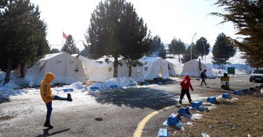 Children play in a tent camp following a powerful earthquake in the Elbistan district of Kahramanmaraş, Türkiye, Feb. 17, 2023. (EPA Photo)