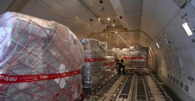 Aid collected in Washington being loaded onto plane at Washington Dulles airport, Feb. 17, 2023. (AA Photo)