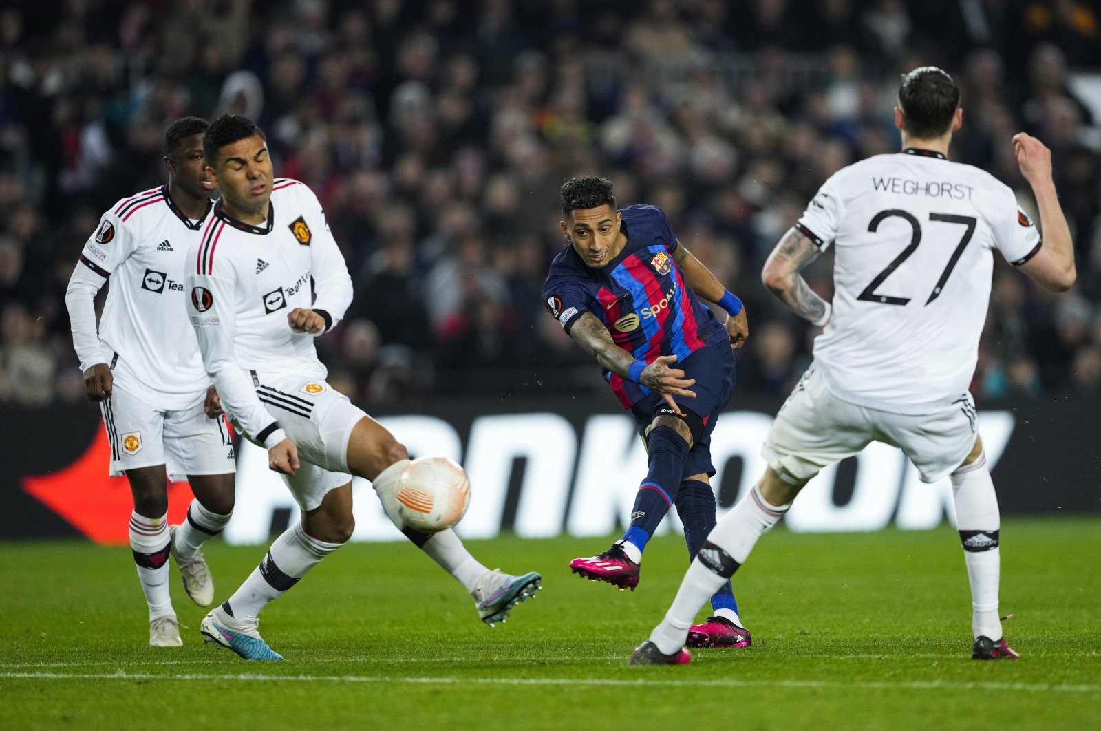 FC Barcelona&#039;s striker Raphinha (C) in action during the Europa League playoff, first leg match between against Manchester United, Barcelona, Spain, Feb. 16 2023. (EPA Photo)