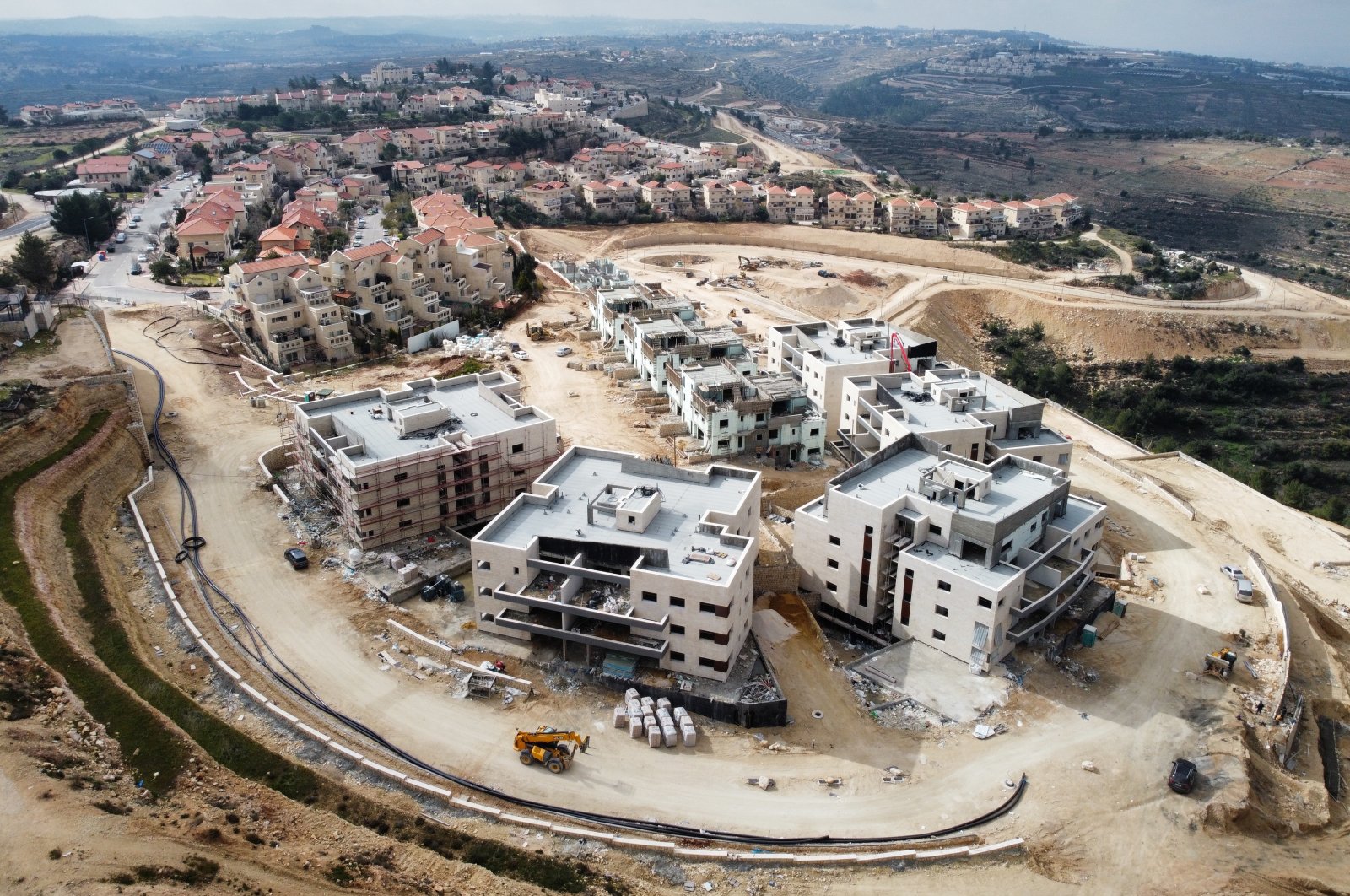 A picture taken with a drone shows a construction site of a new neighborhood in the illegal Neve Daniel settlement, in the Gush Etzion settlement block at the occupied West Bank, Feb. 15, 2023. (EPA Photo)