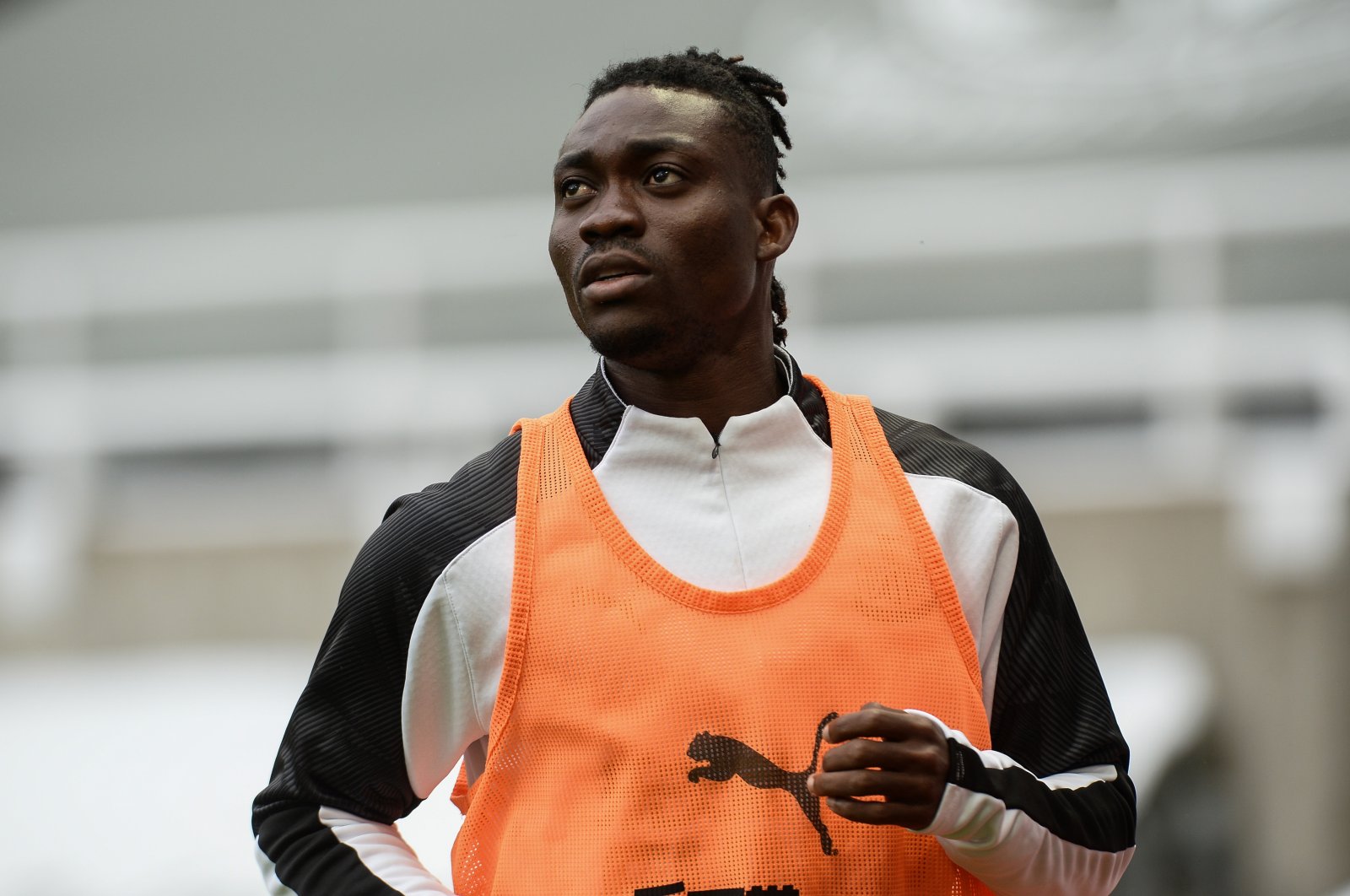 Christian Atsu, warms up before the Premier League football match between Newcastle United and Tottenham Hotspur, at Saint James Park, in Newcastle, U.K., July 15, 2020. (Getty Images Photo)