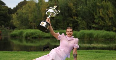 Belarus' Aryna Sabalenka holds the Daphne Akhurst Memorial Cup following her win over Kazakhstan's Elena Rybakina in the women's singles final match at the Australian Open tennis tournament, Melbourne, Australia, Jan. 29, 2023. (AFP Photo)