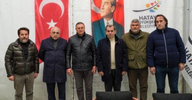 Galatasaray President Dursun Aydın Özbek (center R) poses for a photo with distinguished guests during his visit to quake-affected zones, Hatay, Türkiye, Feb. 19, 2023. (Courtesy of Galatasaray Twitter)