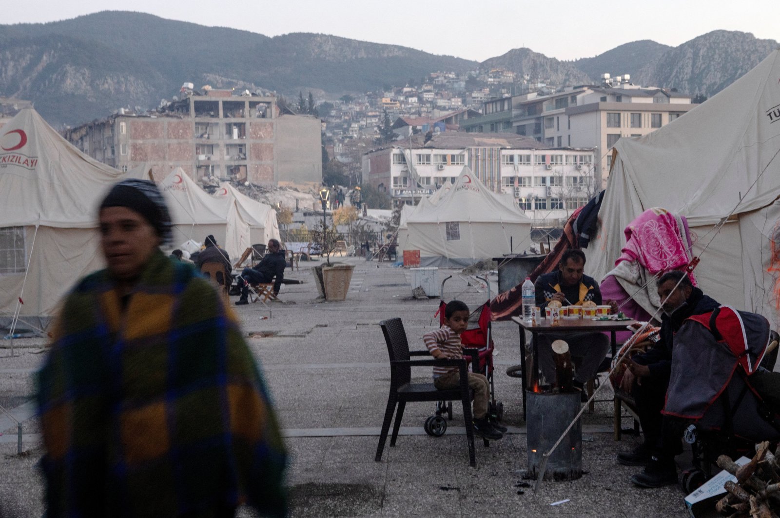 Survivors stay at a temporary tent camp, in the aftermath of the deadly earthquake, in Antakya, Türkiye, Feb. 19, 2023. (Reuters Photo)