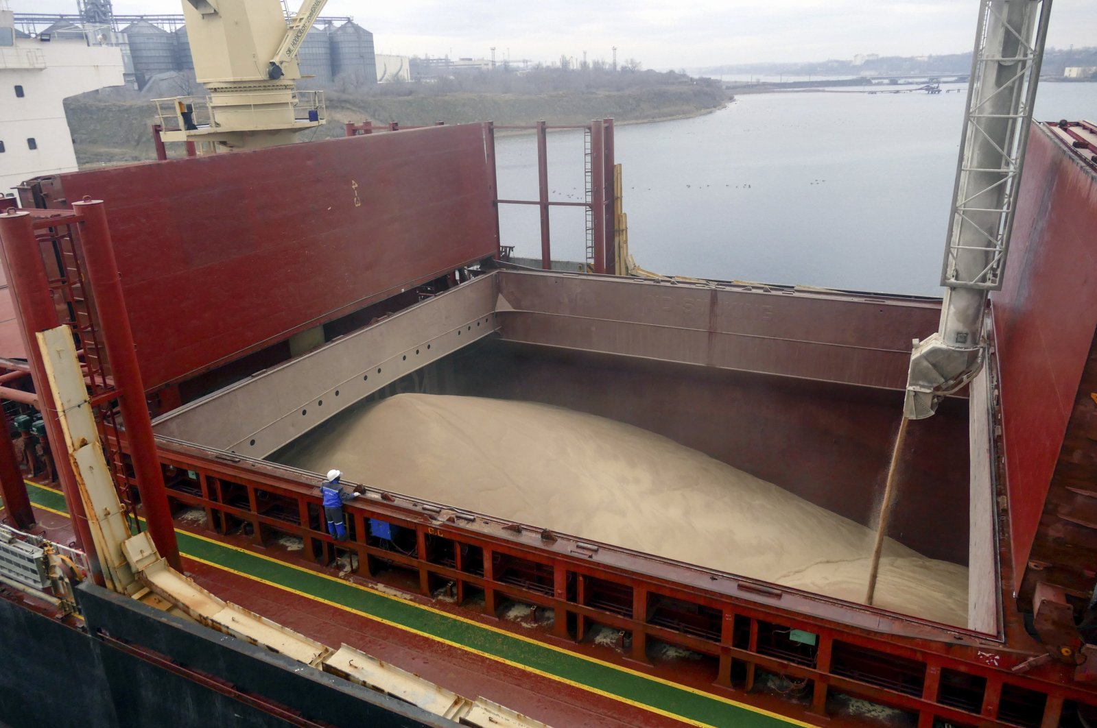 The bulk carrier Valsamitis is loaded with wheat at the Black Sea port of Chornomorsk near Odessa, Ukraine, Feb. 18, 2023. (EPA Photo)