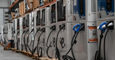 Electric vehicle charging stations in the DBT Group factory, in Brebieres, northern France, Feb. 20, 2023. (AFP Photo)