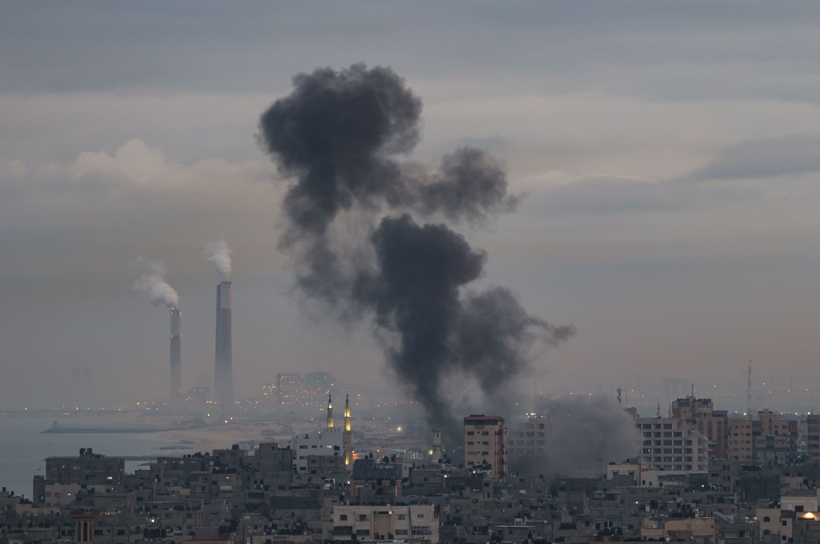 Smoke rises above buildings after Israeli airstrikes on Gaza City, Palestine, Feb. 23, 2023. (AFP Photo)