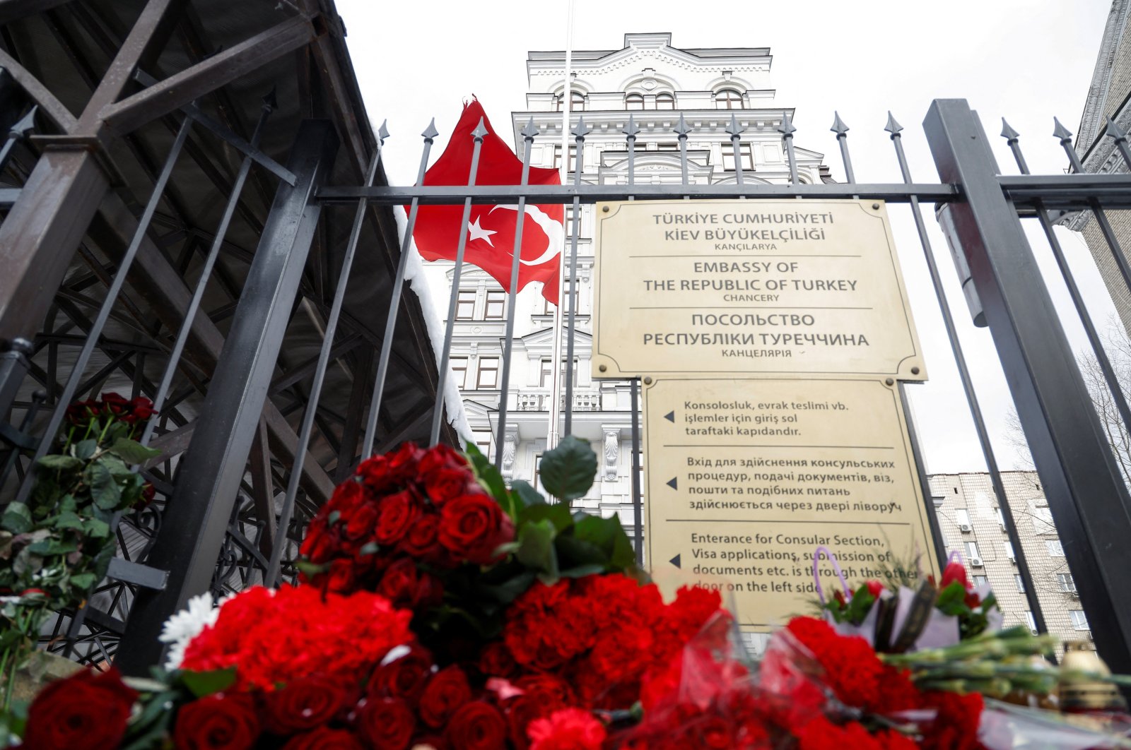 Flowers left by people outside of the Turkish Embassy who paid tribute to the victims of an earthquake in Türkiye and Syria, in Kyiv, Ukraine, Feb. 7, 2023. (Reuters Photo)
