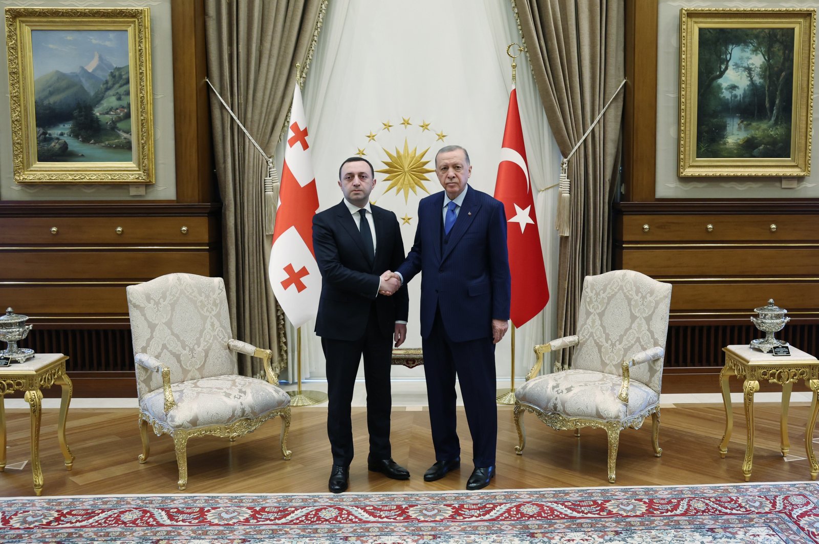 President Recep Tayyip Erdoğan (R) shakes hands with Prime Minister Irakli Garibashvili, in the capital Ankara, Türkiye, Feb. 23, 2023. (AA Photo)