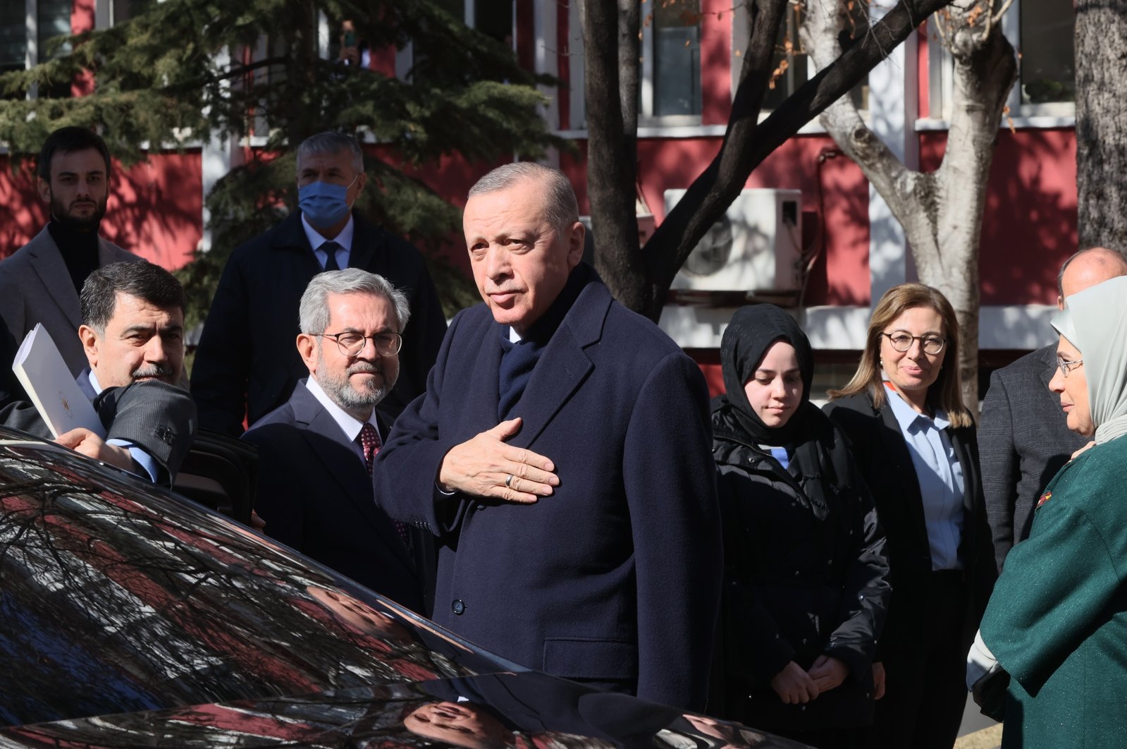 President Recep Tayyip Erdoğan and first lady Emine Erdoğan greet citizens as they arrive at Ankara University Children’s Hospital campus to visit a teenage girl who was rescued from the rubble 248 hours after the deadly earthquakes in the southeast, Ankara, Türkiye, Feb. 22, 2023. (AA Photo)