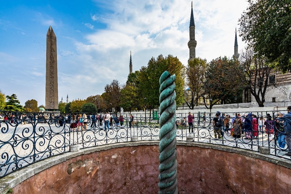 The Serpent Column near the Blue Mosque in the ancient Hippodrome, Istanbul, Türkiye. (Shutterstock Photo)