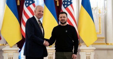 US President Joe Biden shakes hands with Ukrainian President Volodymyr Zelenskyy at Mariinsky Palace on an unannounced visit in Kyiv, Ukraine, Monday, Feb. 20, 2023. (Reuters photo)