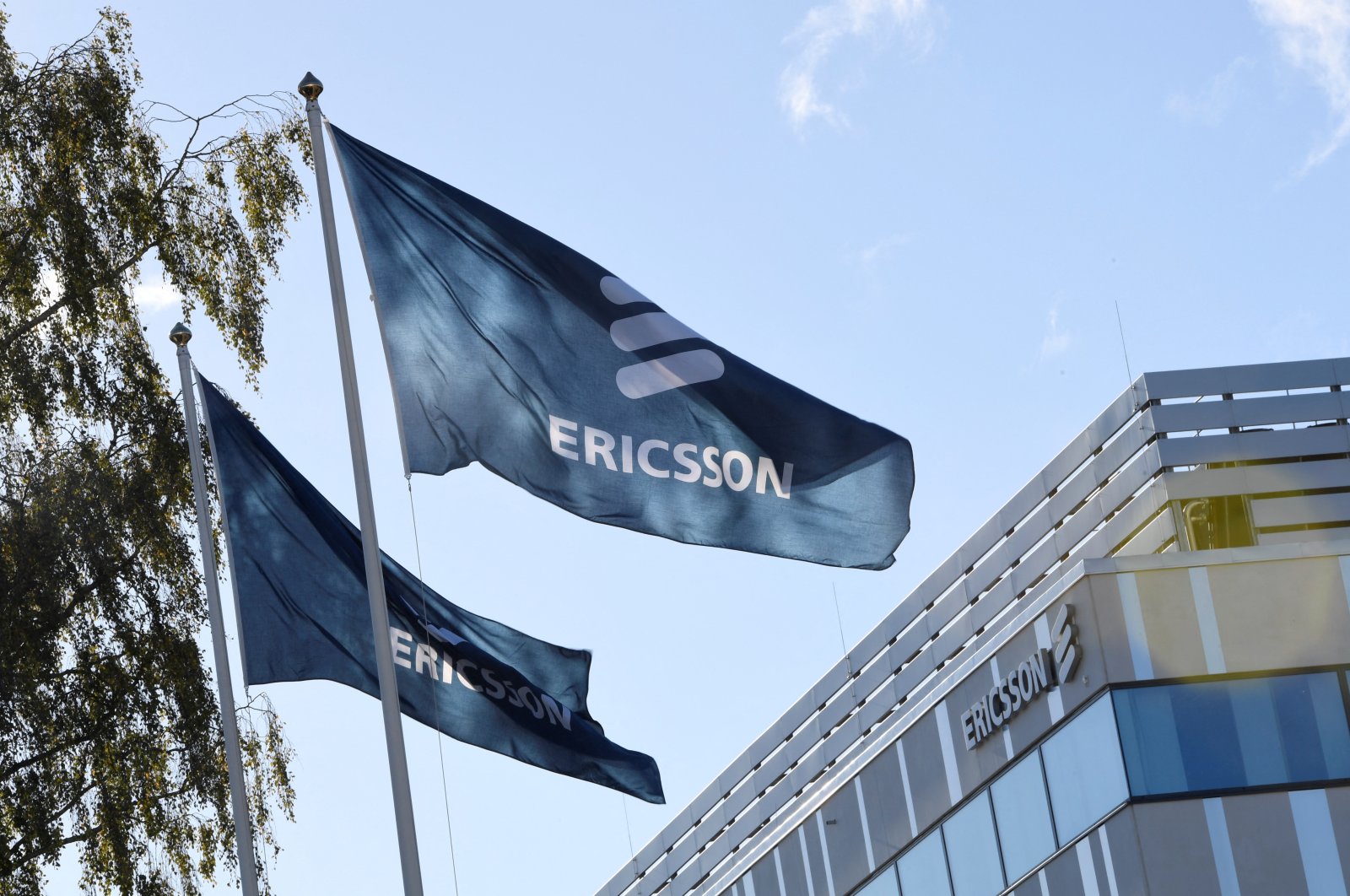 Flags with the Ericsson logo are pictured outside the company&#039;s head office in Stockholm, Sweden, Oct. 4 , 2016. (Reuters Photo)