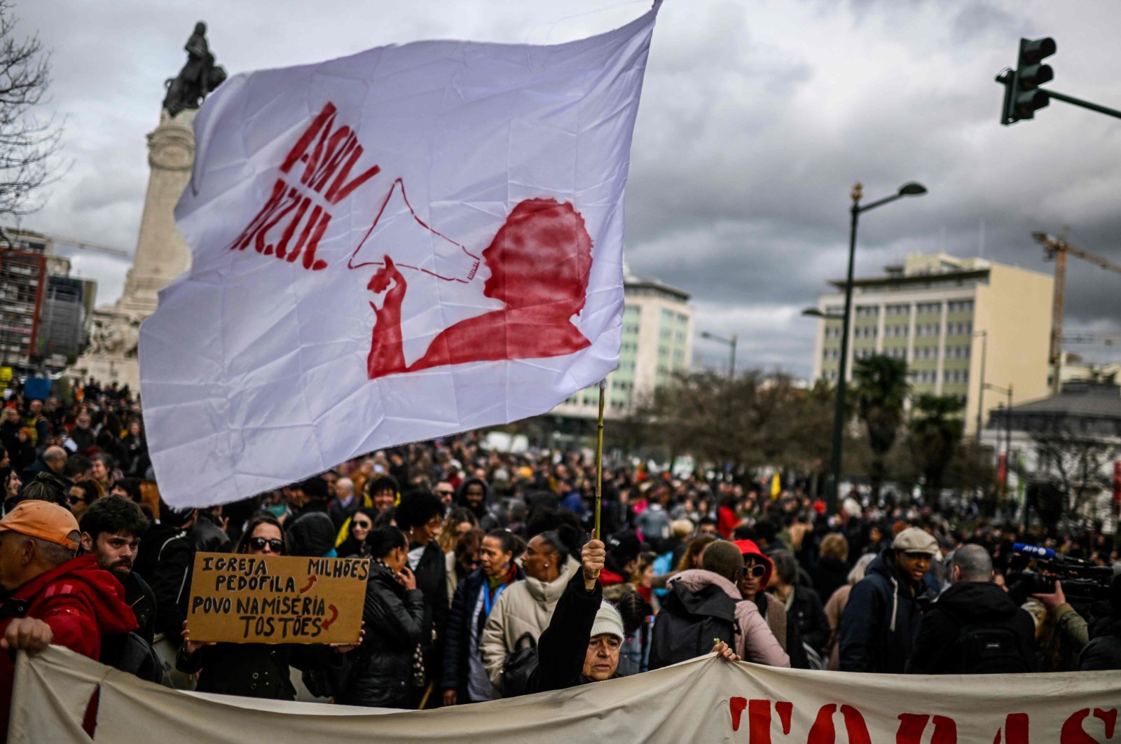 Protesters gather at Marques do Pombal square during a protest against the rise of the cost of living, and for housing rights in Lisbon, Portugal, Feb. 25, 2023. (AFP Photo)