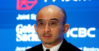 Fan Bao, founder, chairperson and CEO of China Renaissance Group, holds a news conference on its IPO in Hong Kong, China Sept. 13, 2018. (Reuters Photo)