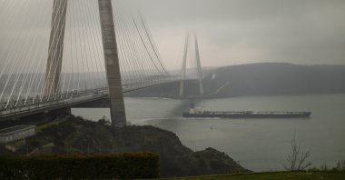 The oil tanker ship SCF Samotlor sails under Yavuz Sultan Selim bridge as it passes through the Bosporus after departing from Russia's Novorossiysk port, in Istanbul, March 1, 2022. (AP Photo)