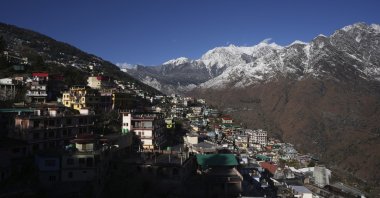 The town of Joshimath is seen along side snow-capped mountains, in the Himalayan mountain state of Uttarakhand, India, Jan. 21, 2023. (AP Photo)