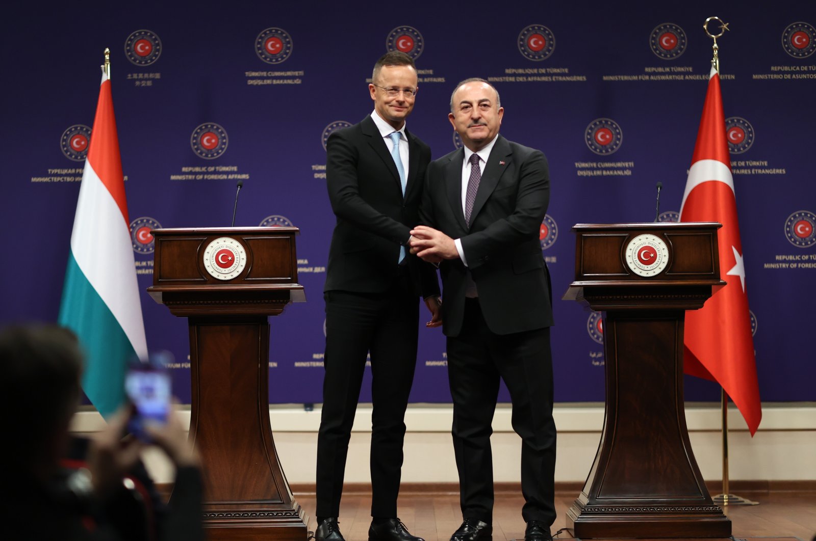 Foreign Minister Mevlüt Çavuşoğlu (R) shakes hands with Hungarian Foreign Minister Peter Szijjarto, in the capital Ankara, Türkiye, Feb. 27, 2023. (AA Photo)