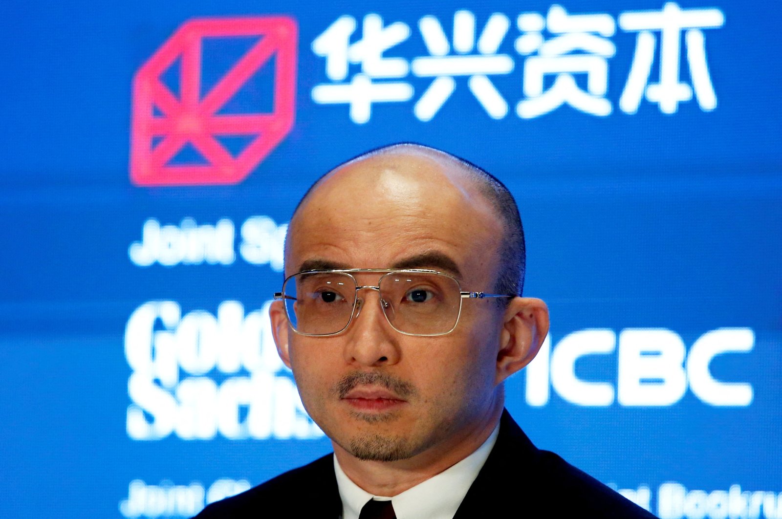 Fan Bao, founder, chairperson and CEO of China Renaissance Group, holds a news conference on its IPO in Hong Kong, China Sept. 13, 2018. (Reuters Photo)