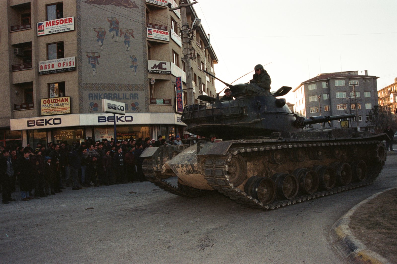 An armored tank rolls down a street toward the Akıncı Base in the Sincan district of the Turkish capital Ankara, on Feb. 4, 1997. (AA Photo)